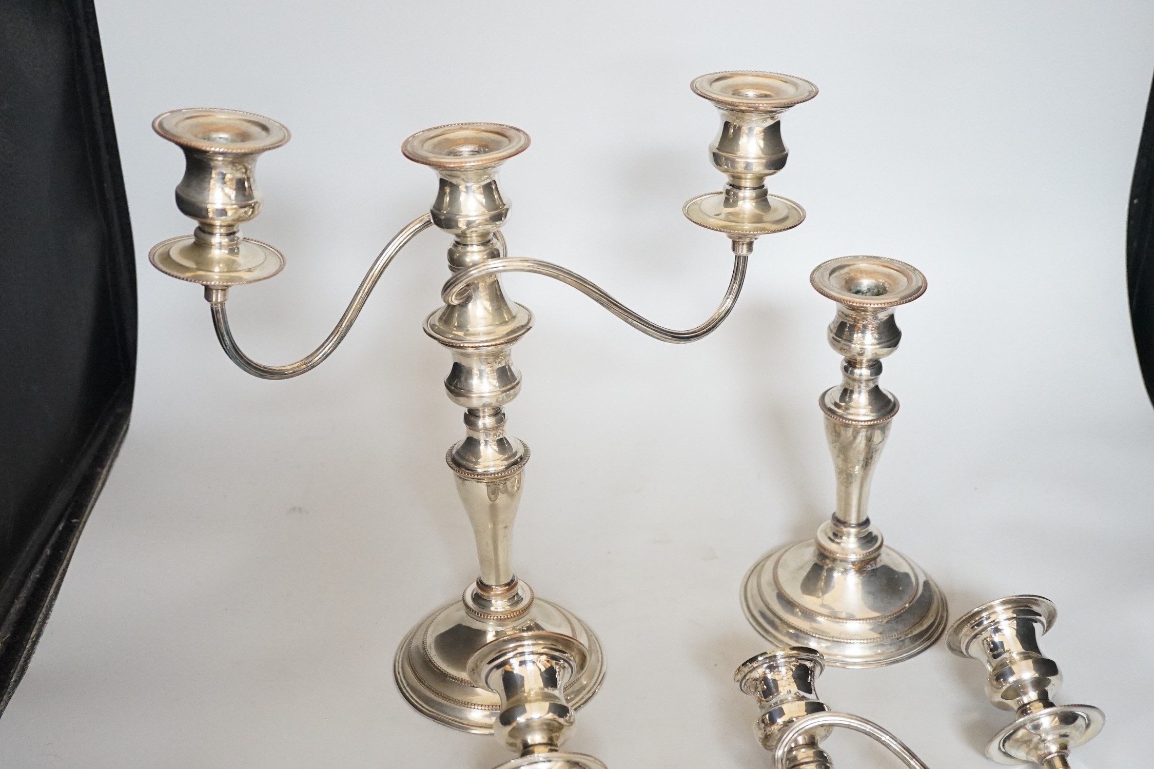 A pair of silver plated candelabra